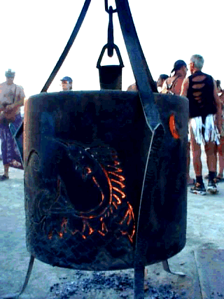 The cauldron is lit by a fresnel lens on Monday before the burn, and is kept burning constantly until the Man goes up.
